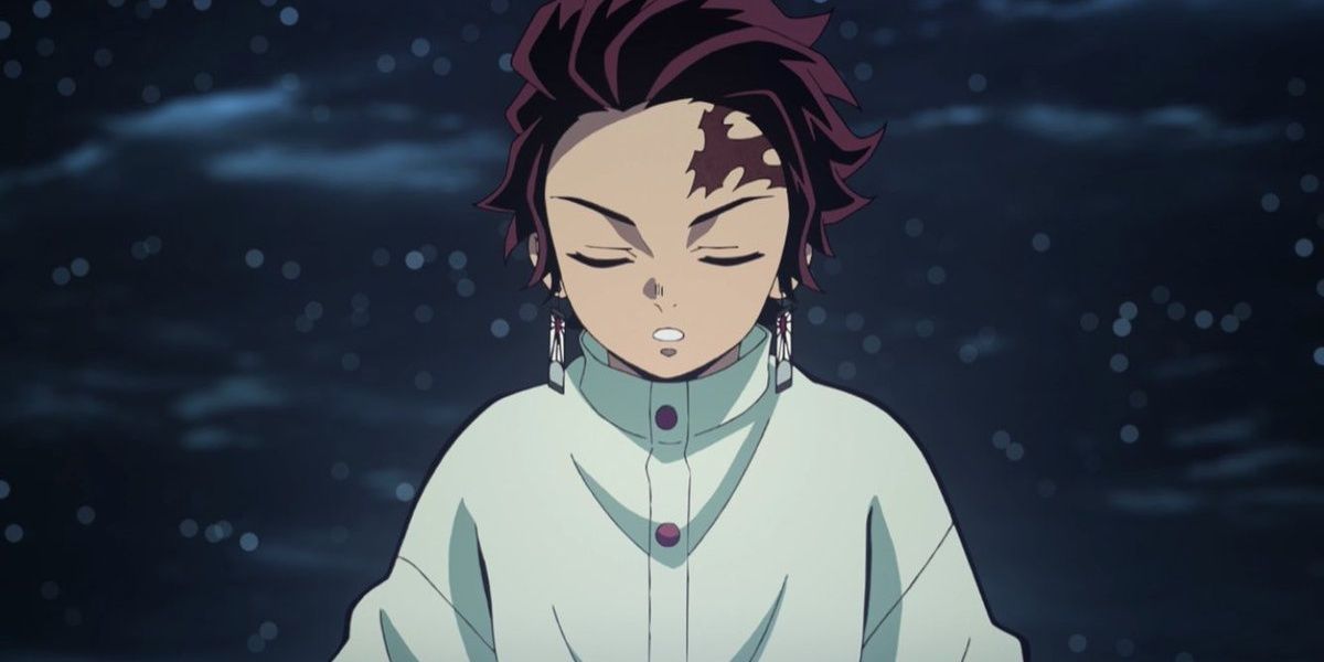 Image shows Tanjiro Kamado from Demon Slayer concentrating