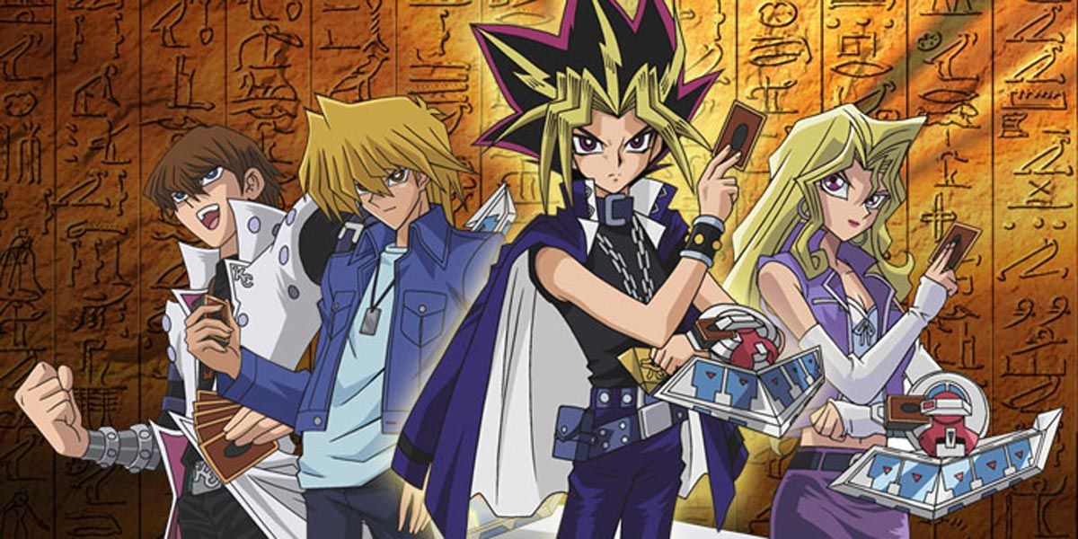 Yu-Gi-Oh Original Cast In Front Of An Egyptian Bakcground
