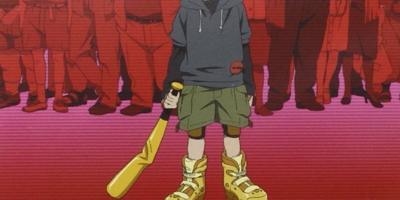 Lil' Slugger standing in front of a crowd of people in Paranoia Agent