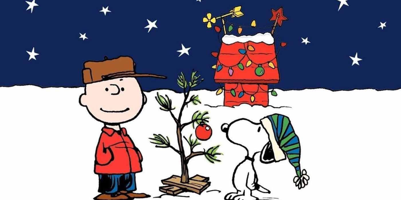 Charlie Brown and Snoopy with their Christmas tree