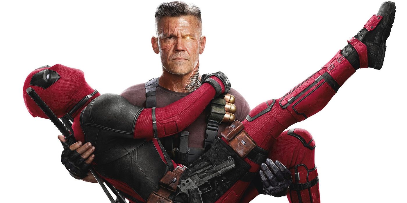 Cable holding Deadpool in his arms