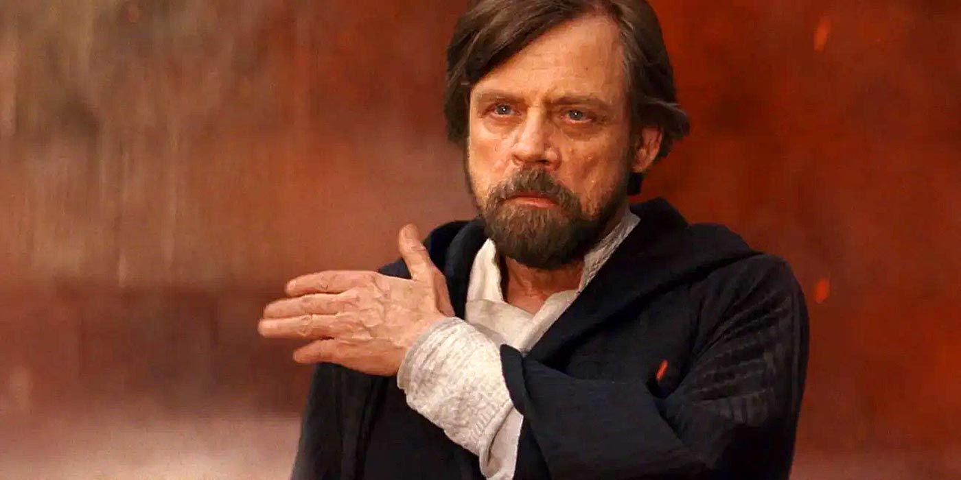 Luke Skywalker dusting off his shoulder in The Last Jedi