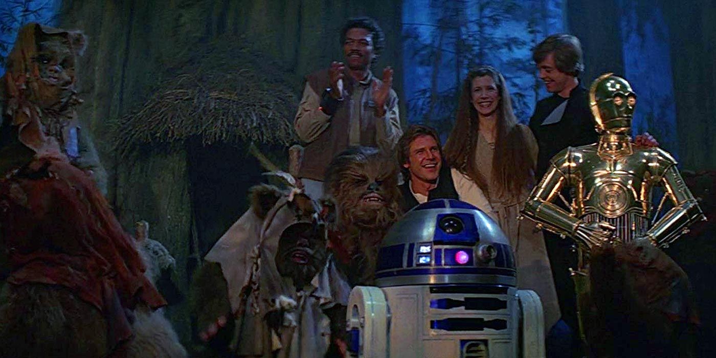 The heroes of Return of the Jedi celebrate the defeat of the Empire with the Ewoks on Endor.