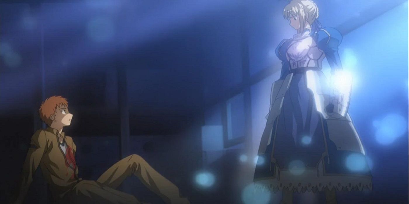 Saber stands over Shirou Emiya who is sitting on the floor