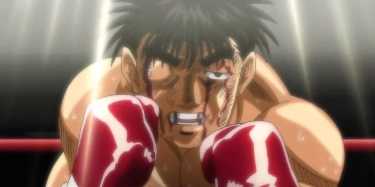 A heavily bruised Ippo continues to fight in Hajime no Ippo