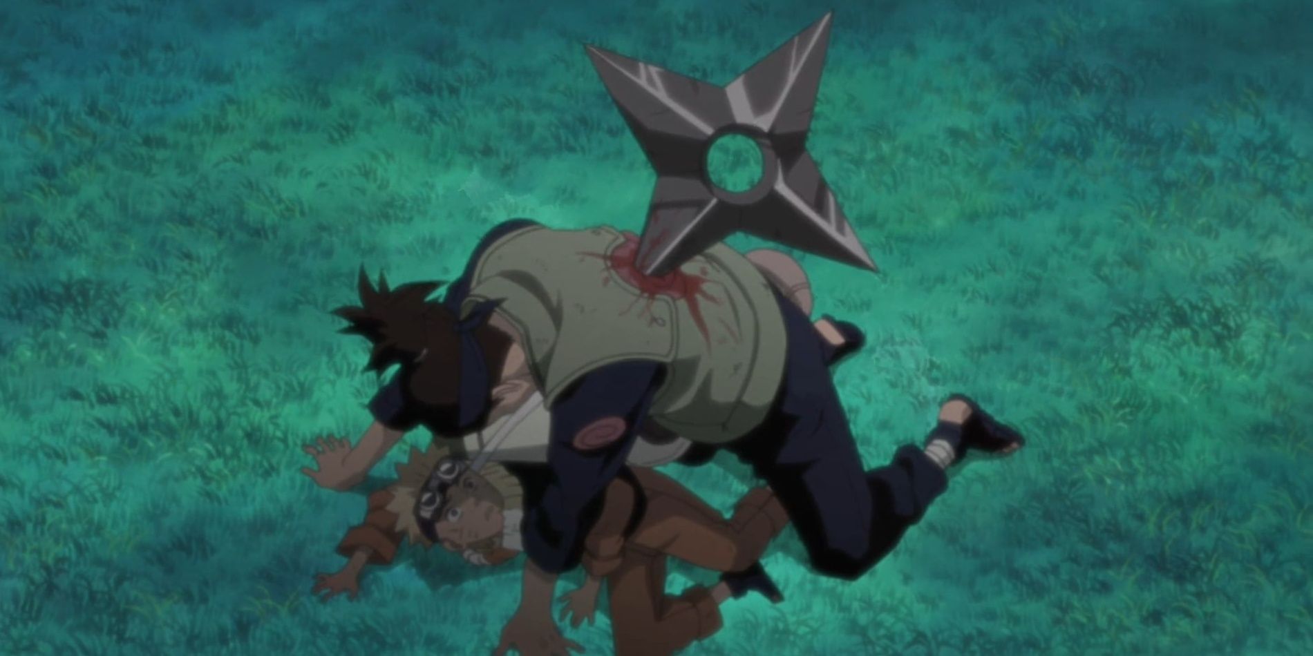 Iruka is hit in the back to save Naruto 