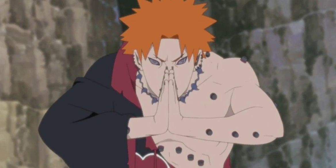 Pain injured in Naruto Shippuden about to use a jutsu.