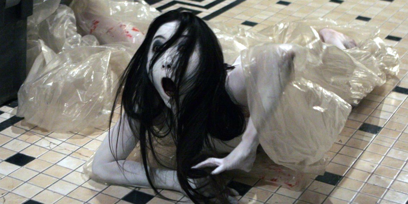 Kayako Saeki crawls on a bathroom floor in the Grudge