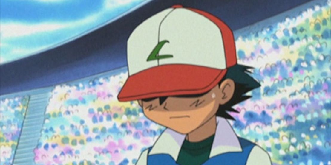 Ash looking sad and defeated in Pokémon.