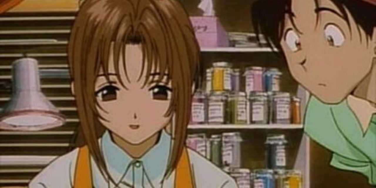 Kintaro looks over Naoko's shoulder as she works in Golden Boy.