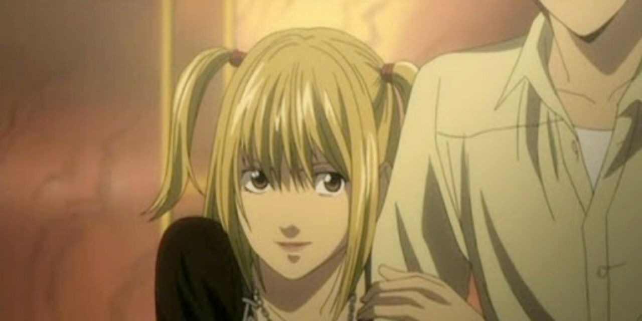 misa amane clinging to light yagami in death note