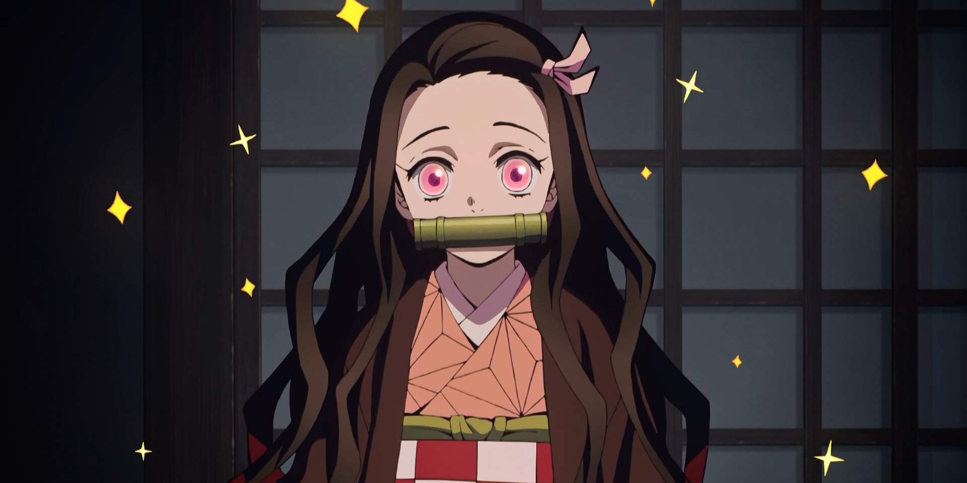 Nezuko sparkling in front of a closed wall partition.