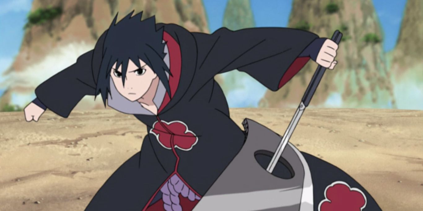 Sasuke dressed in an Akatsuki robe as he fights in Naruto Shippuden
