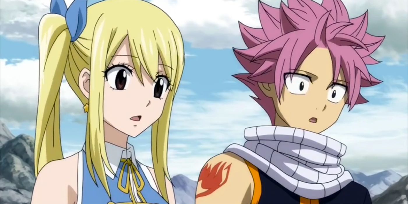 Lucy and Natsu looking stunned in front of a cloudy sky.