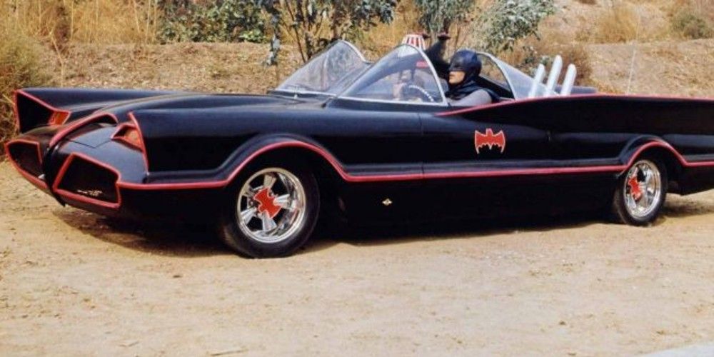 Batman rides in his Batmobile in Batman 1966