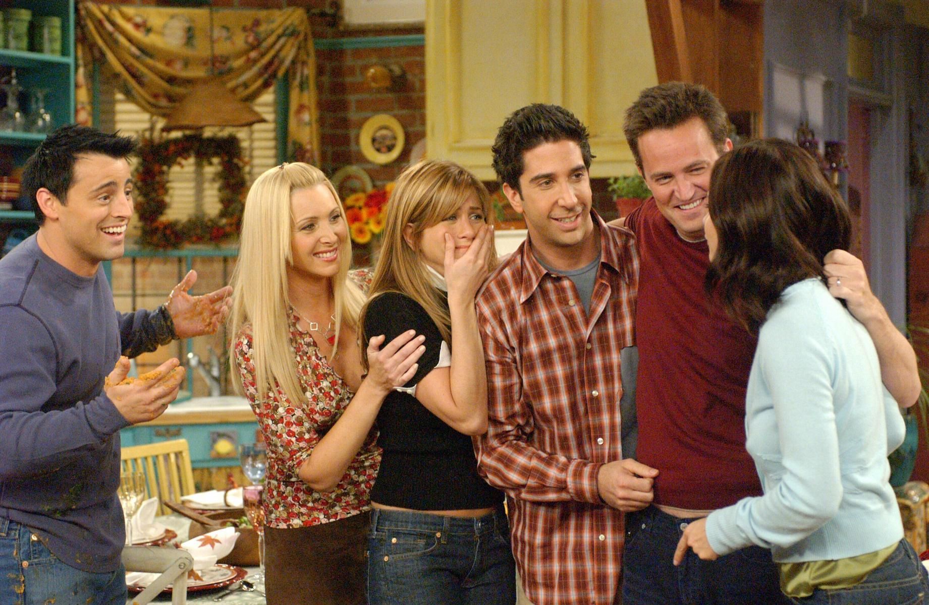 Friends cast happy and hugging
