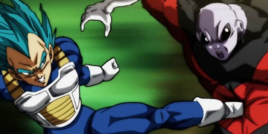 Vegeta lutando contra Jiren e chutando-o no estômago em Dragon Ball Super