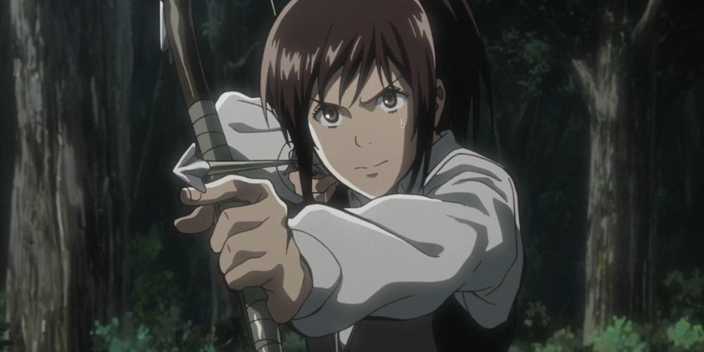 Sasha shooting an arrow