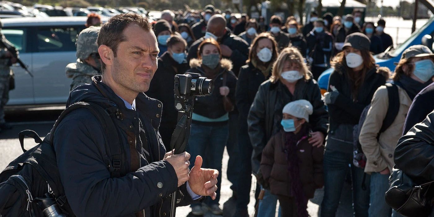 Jude Law amidst masked crowd in Contagion