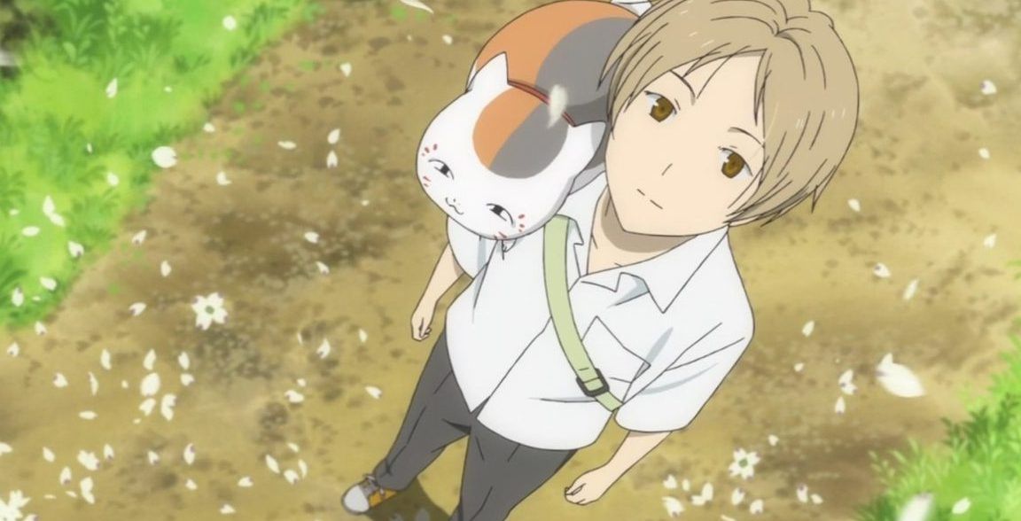 Natsume and his cat in Natsume's Book Of Friends.