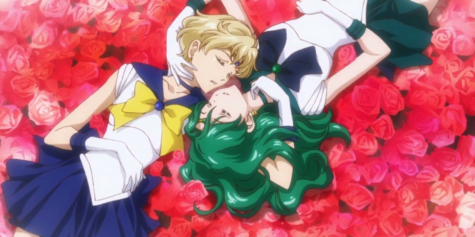 Sailor Uranus laying opposite sailor Neptune on a bed of Roses. They are gentle caressing each other with their eyes closed. (Sailor Moon)
