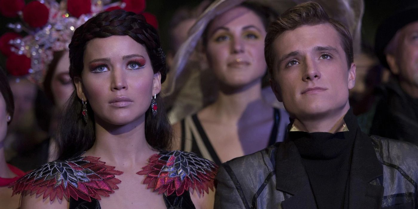 Katniss (Jennifer Lawrence) and Peeta (Josh Hutcherson) at their engagement party in The Hunger Games: Catching Fire