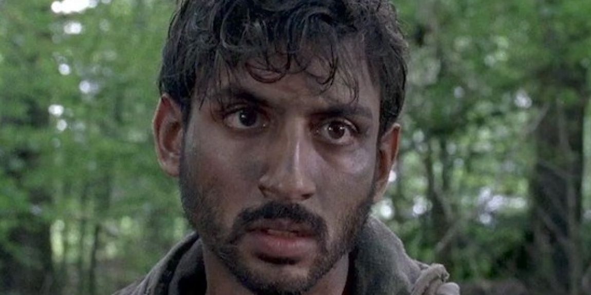 Saddiq looks distraught in the woods in "The King, The Widow, and Rick" in The Walking Dead