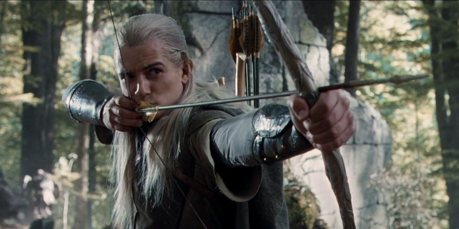Legolas draws the Bow of the Galadhrim to fire at an Uruk-Hai in Amon Hen