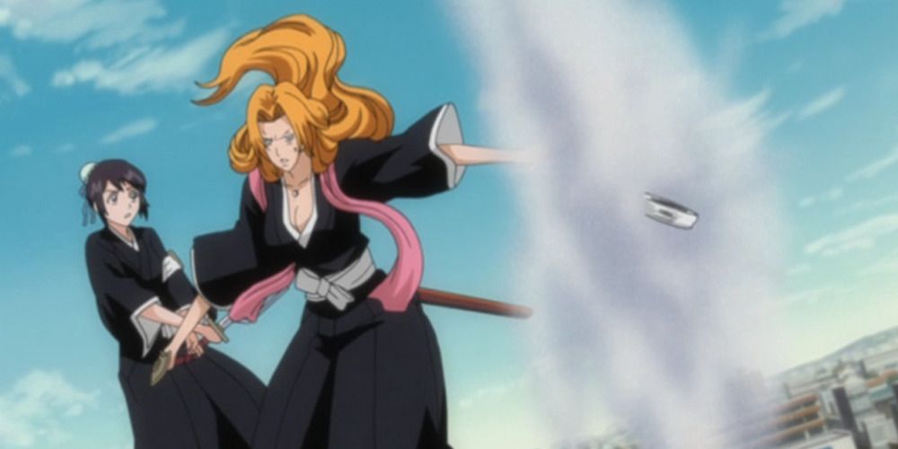 rangiku matsumoto is protecting momo in the bleach anime
