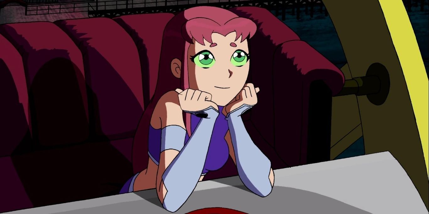 Starfire daydreams out of a window in DC's Teen Titans animated series.
