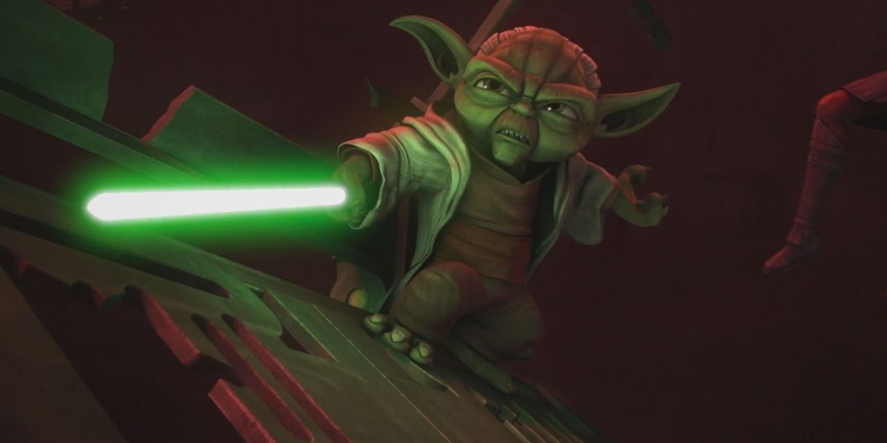yoda standing with lightsaber out