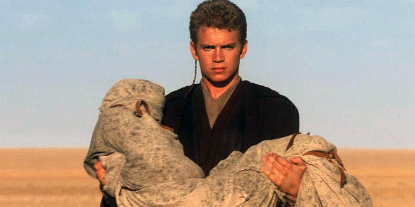 Anakin Skywalker carrying the cloth-wrapped body of his dead mother through the desert