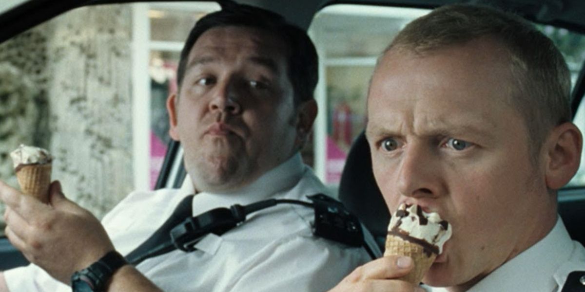 Simon Pegg and Nick Frost eating ice cream inside their vehicle