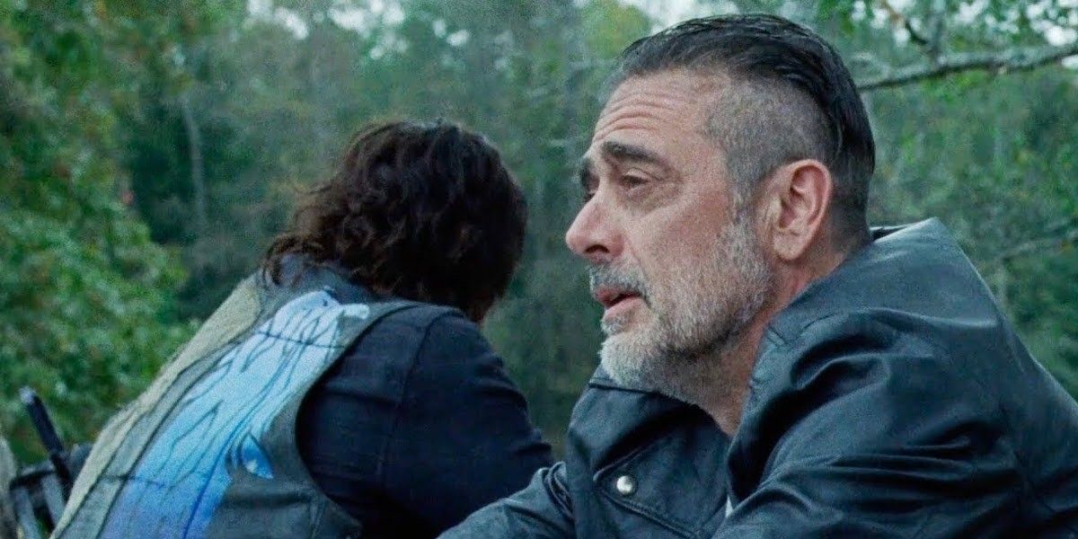 Negan (Jeffrey Dean Morgan) talking to Daryl (Norman Reedus), whose back is turned to him, on The Walking Dead