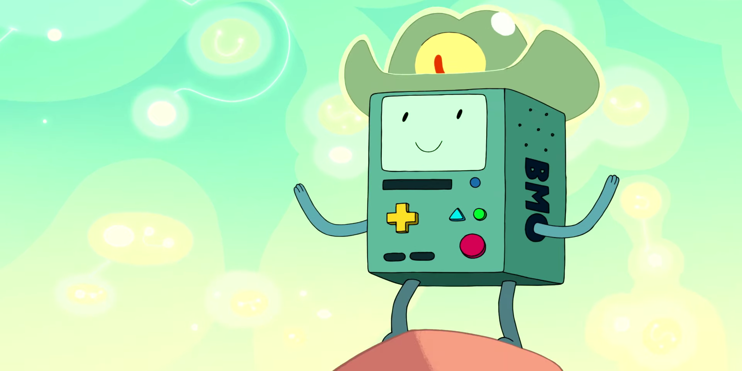 BMO standing on a rock wearing an alien shapeshifter turned into a cowboy hat.