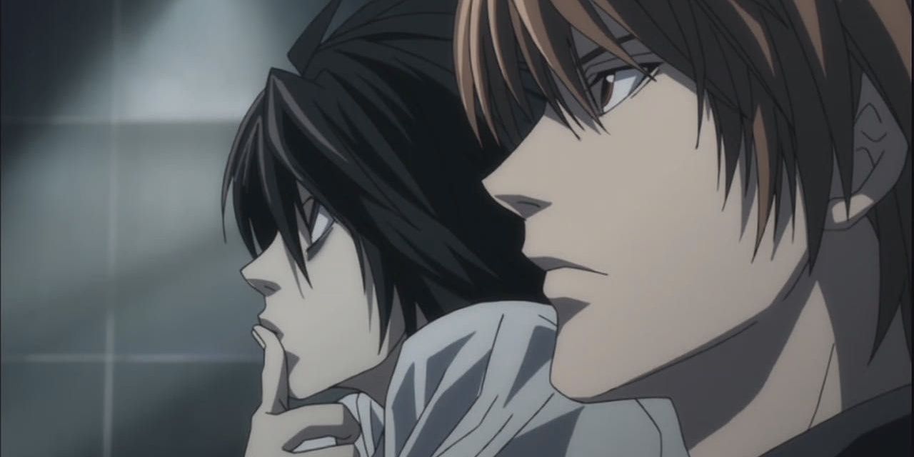 L and Light looking at something in Death Note