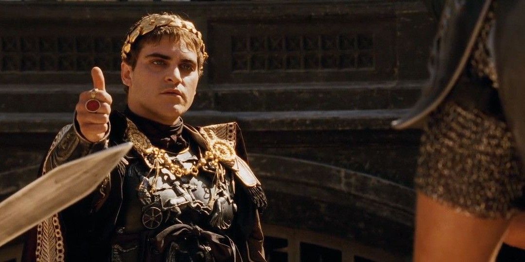 Joaquin Phoenix gives a thumbs up as Commodus in Gladiator II