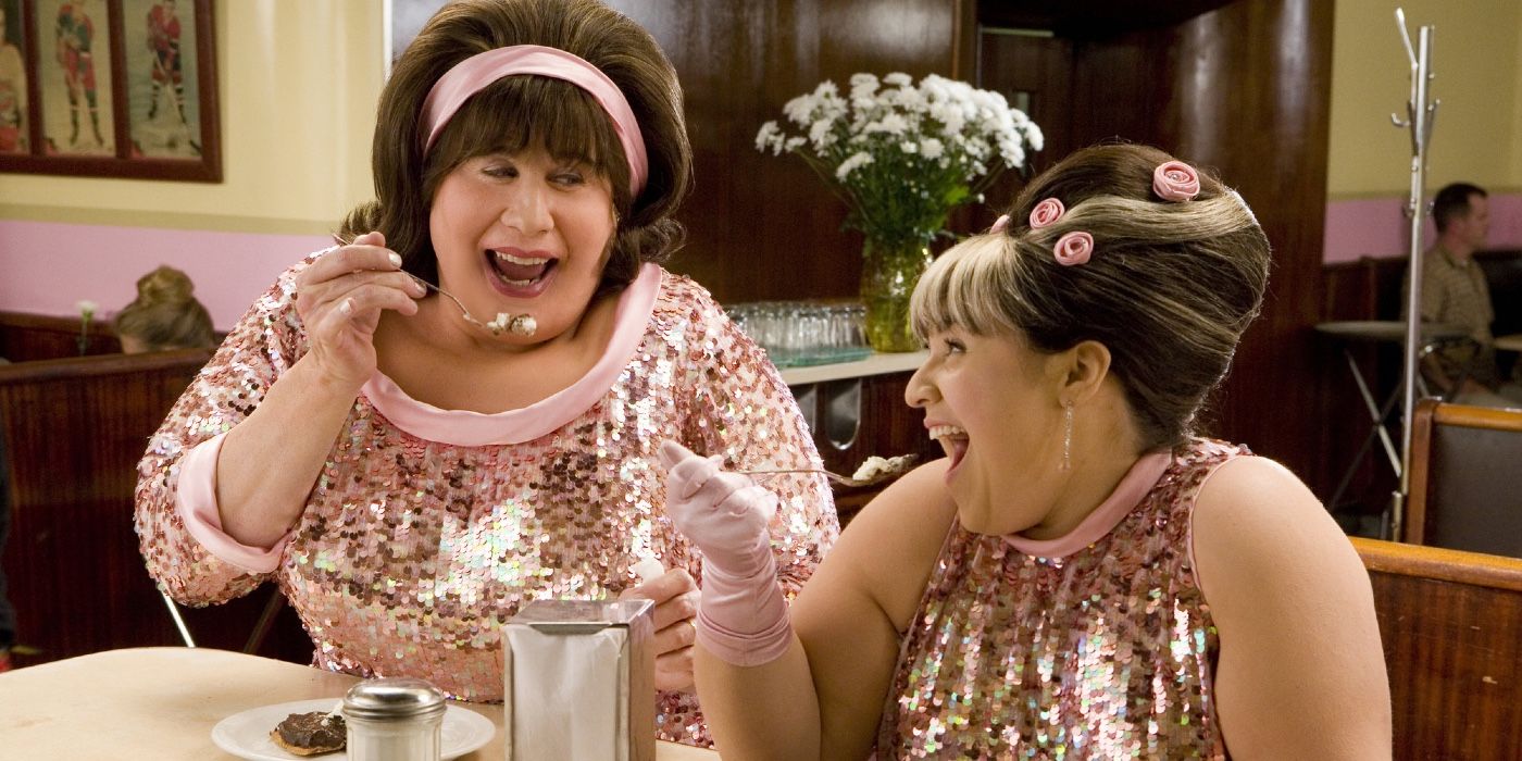 Hairspray's Tracey and her mother wear matching pink sparkly outfits