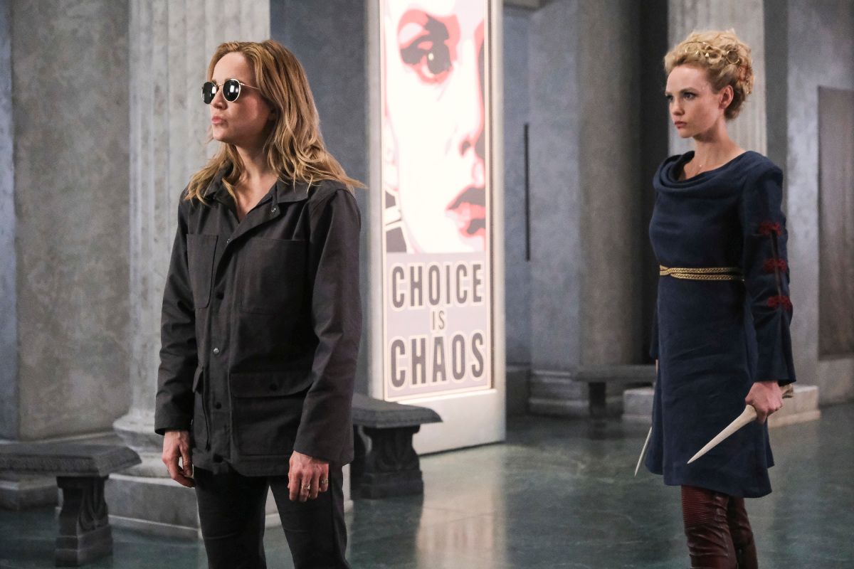 Legends of Tomorrow -- &quot;Swan Thong&quot; -- Image Number: LGN515a_0190b.jpg -- Pictured (L-R): Caity Lotz as Sara Lance/White Canary and Joanna Vanderham as Atropos -- Photo: Bettina Strauss/The CW -- © 2020 The CW Network, LLC. All Rights Reserved.