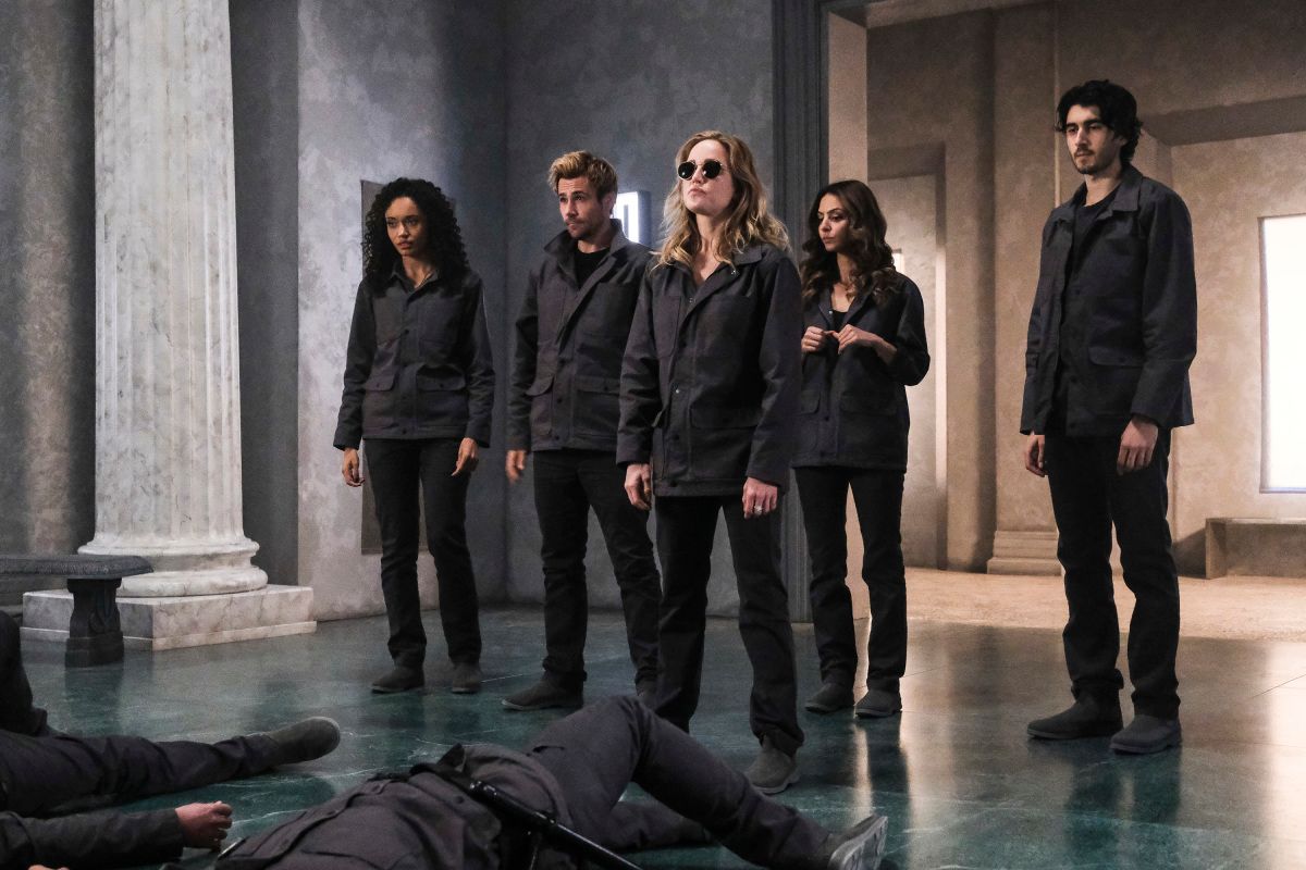 Legends of Tomorrow -- &quot;Swan Thong&quot; -- Image Number: LGN515a_0012b.jpg -- Pictured (L-R): Olivia Swan as Astra, Matt Ryan as Constantine, Caity Lotz as Sara Lance/White Canary, Tala Ashe as Zari and Shayan Sobhian as Behrad Taraz -- Photo: Bettina Strauss/The CW -- © 2020 The CW Network, LLC. All Rights Reserved.