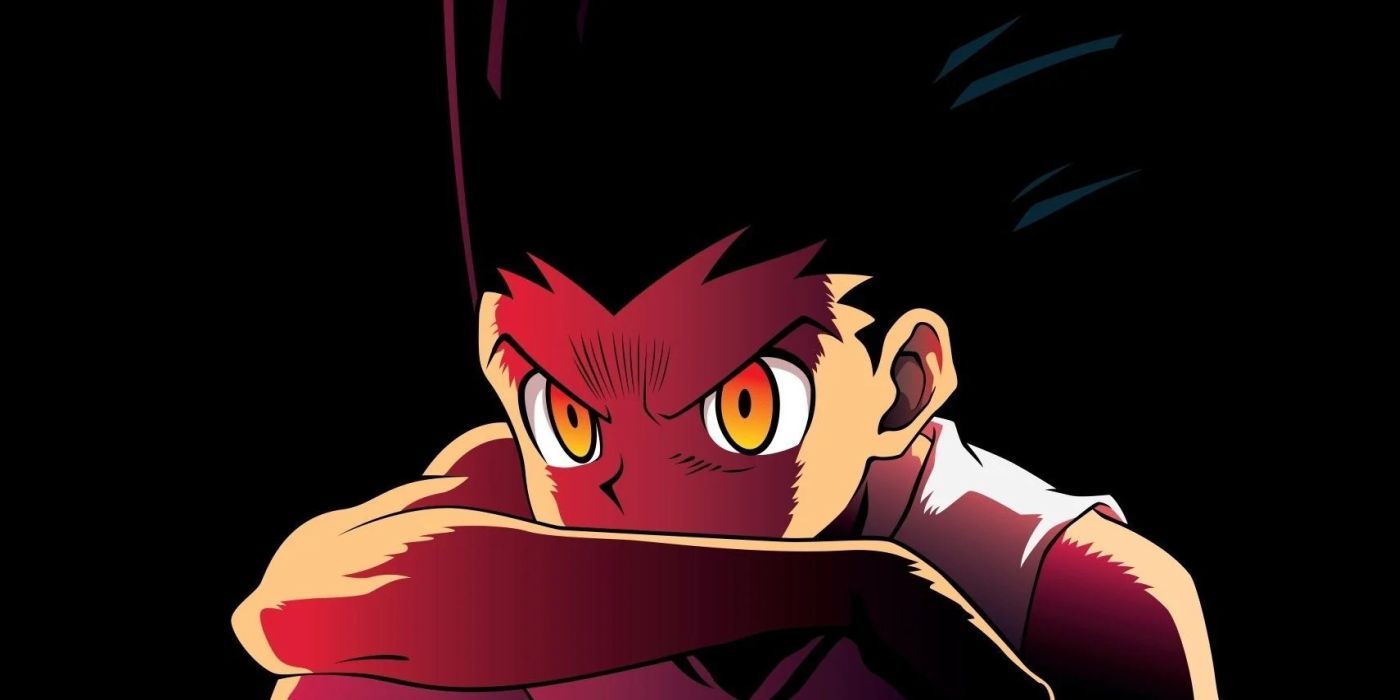 Gon Freeces with a fierce look in his eyes and his arm covering half of his face in Hunter x Hunter