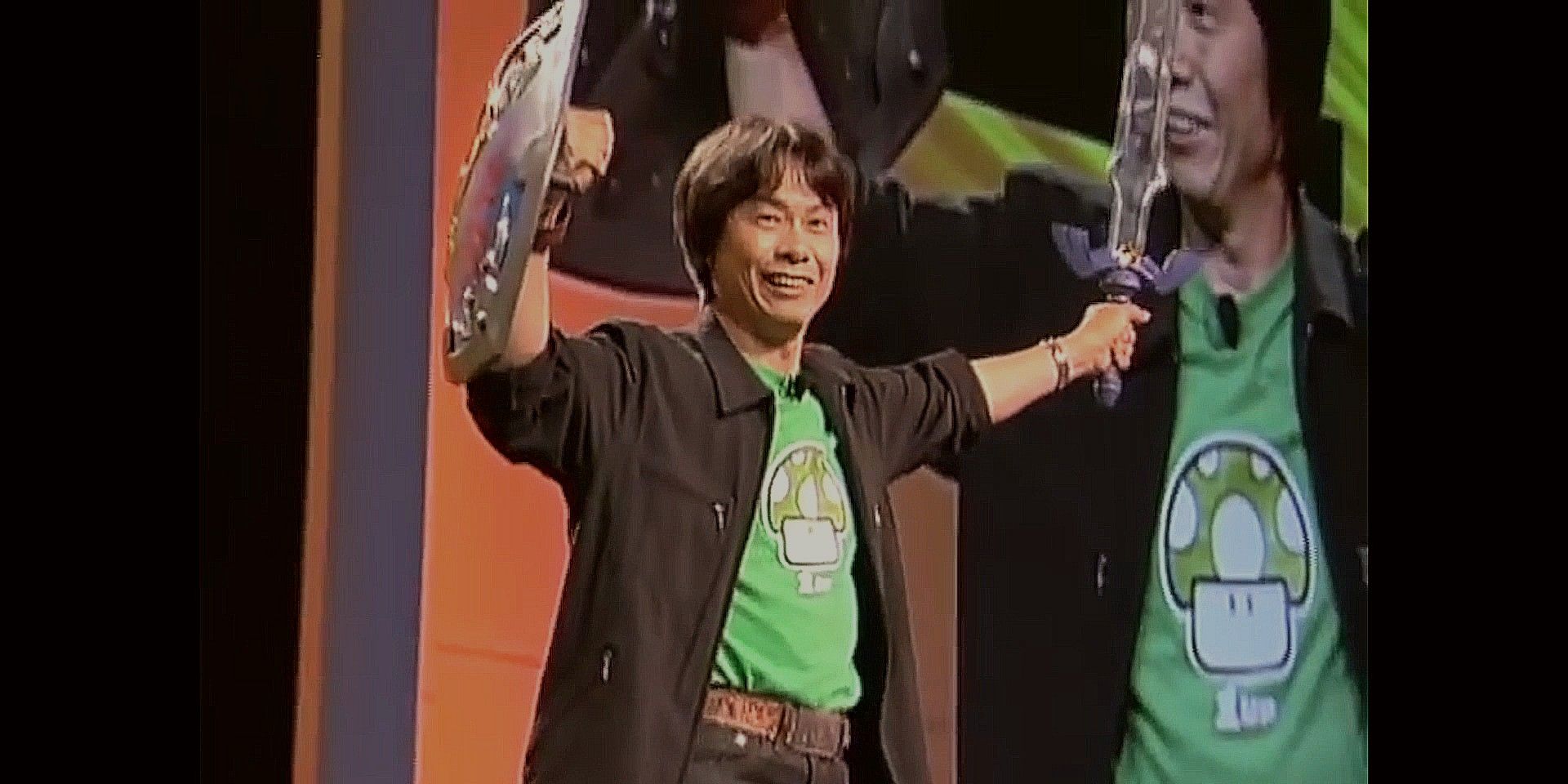 Shigeru Miyamoto E3 2004 hands in air