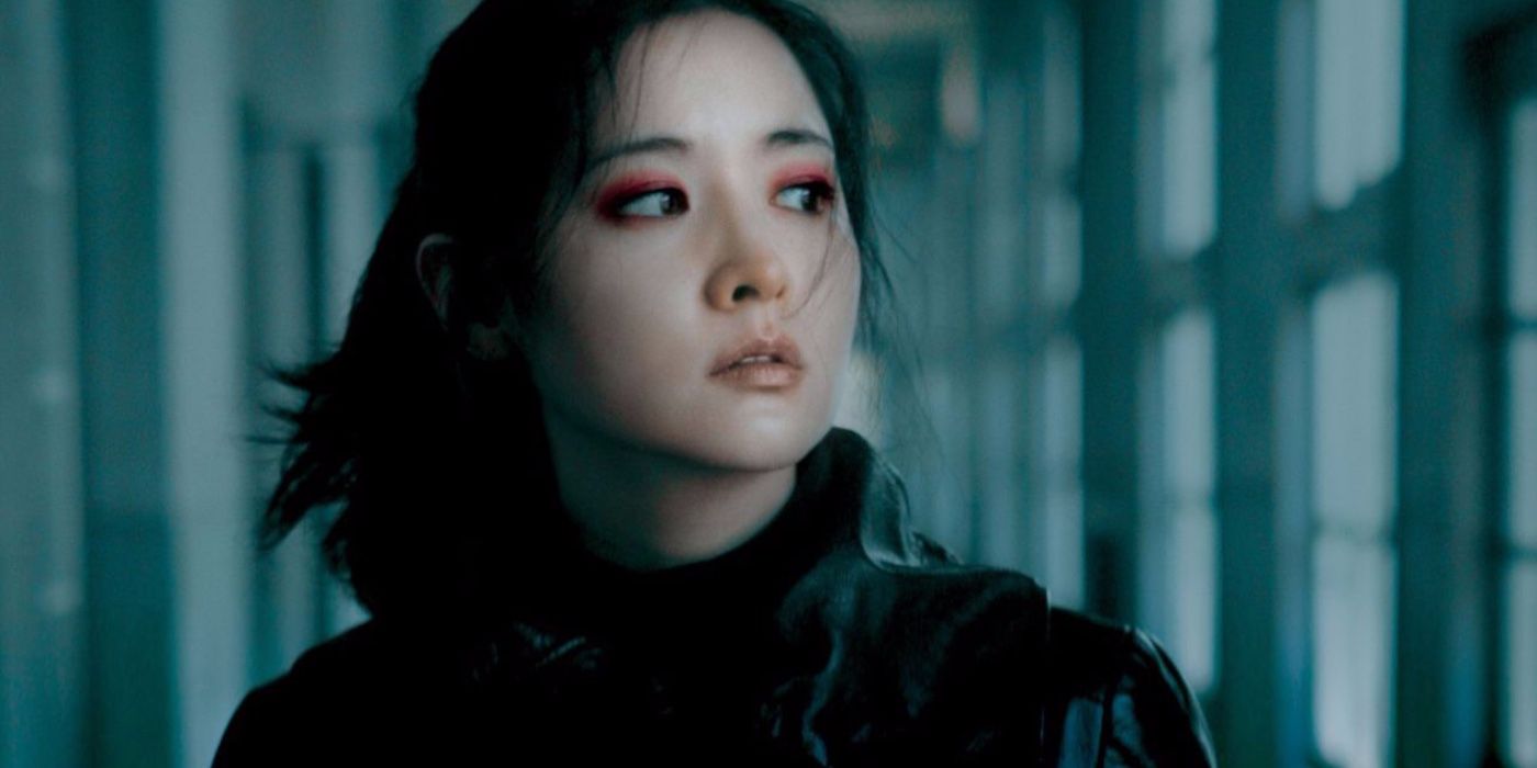 geum-ja looks out of a window in Lady Vengeance