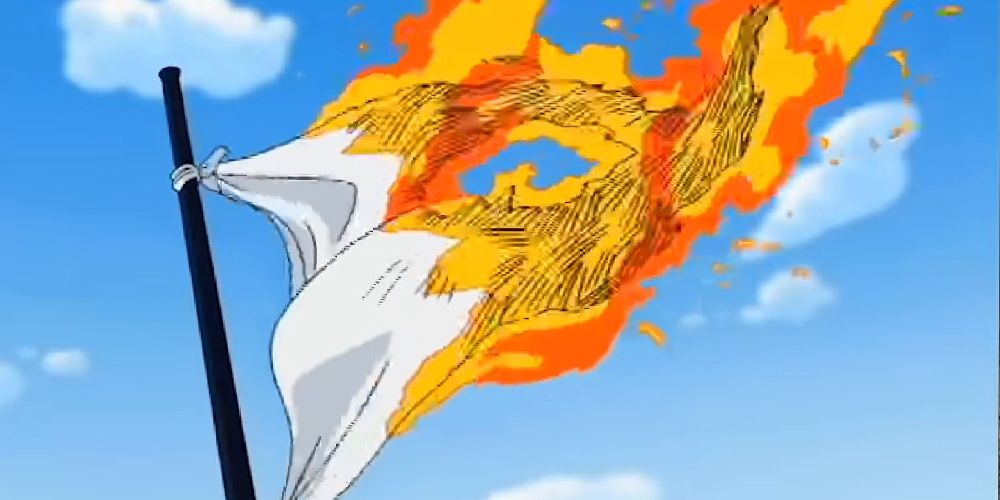 The World Government Flag on fire after Luffy orders Sniper King to shoot it in One Piece.