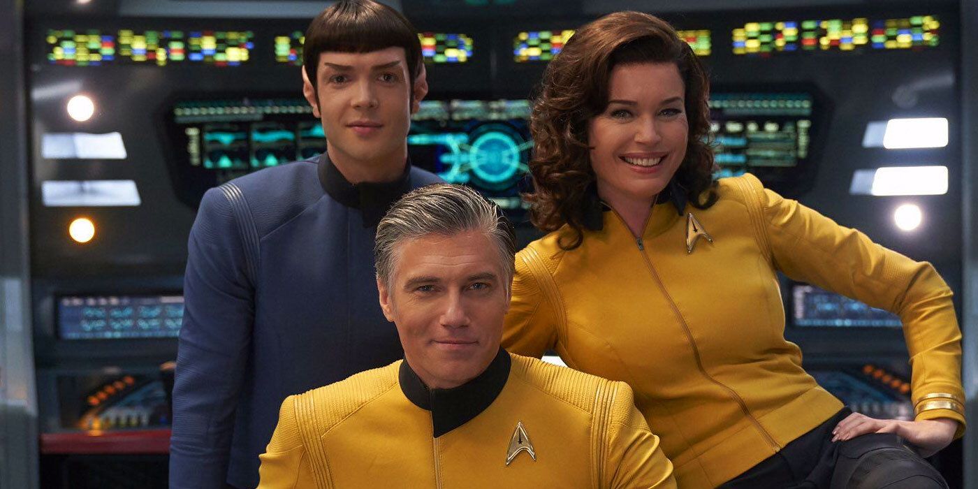 Spock, Pike and Number One smile on the Bridge of the Enterprise in Strange New Worlds