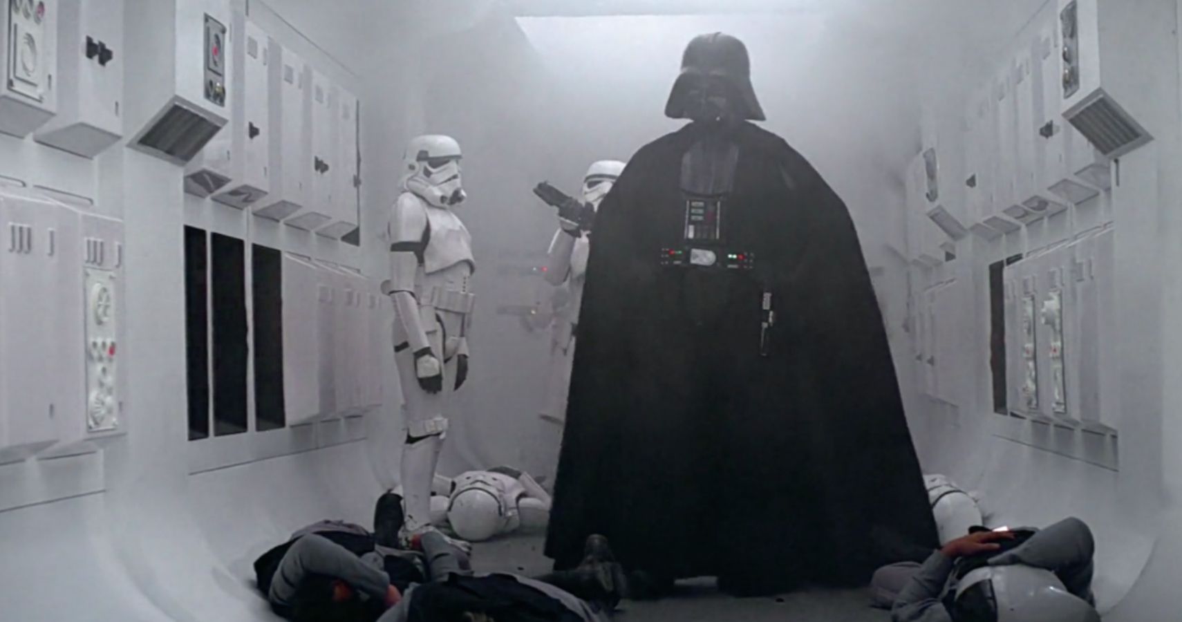 Darth Vader walks the corridor on Tantiv IV with Stormtroopers