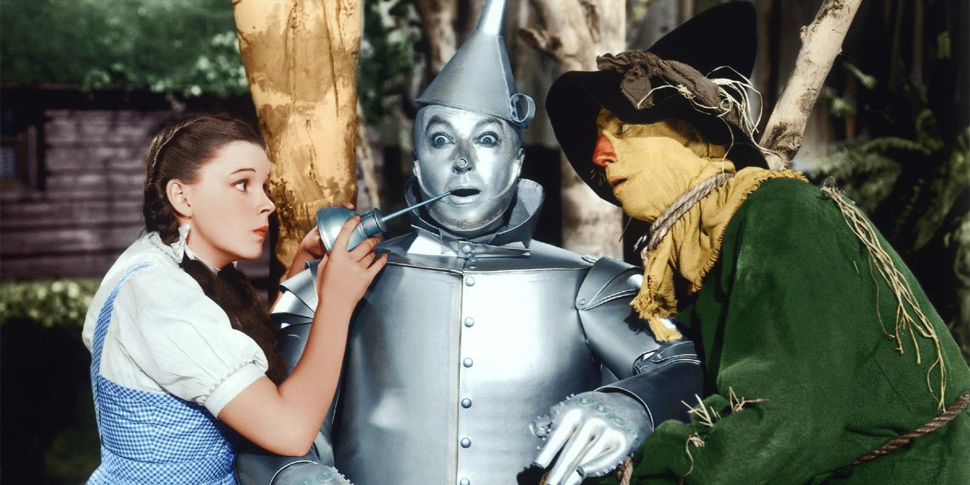 Dorothy, Tin Man, and Scarecrow in Wizard of Oz