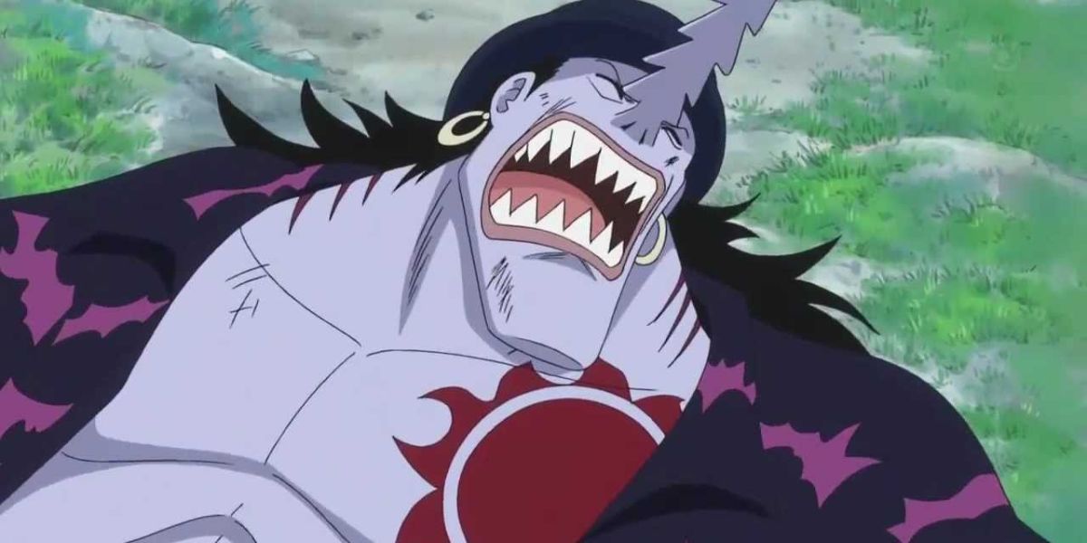 One Piece's Arlong lying on the ground defeated