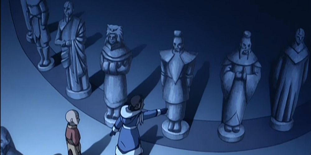 Aang And Katara With Avatar Statues