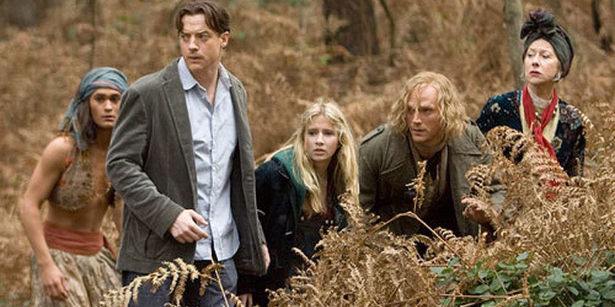 Mo, Meggie, Farid, Dustfinger and Elinor standing in a field in Inkheart